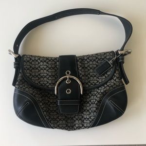 Small Coach Handbag with black leather.